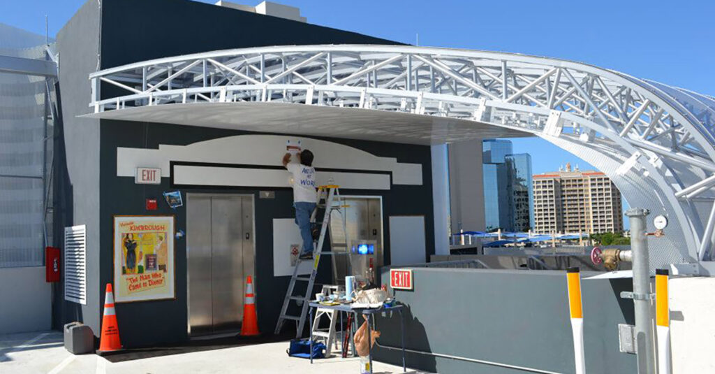 Photo of a mural I painted on the top floor of the Palm Ave Parking Garage in Sarasota Fl that showcased the Players Theater