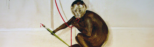 A detail photo of a large residential mural in Sarasota, FL showing a monkey holding a red string and paint brush.