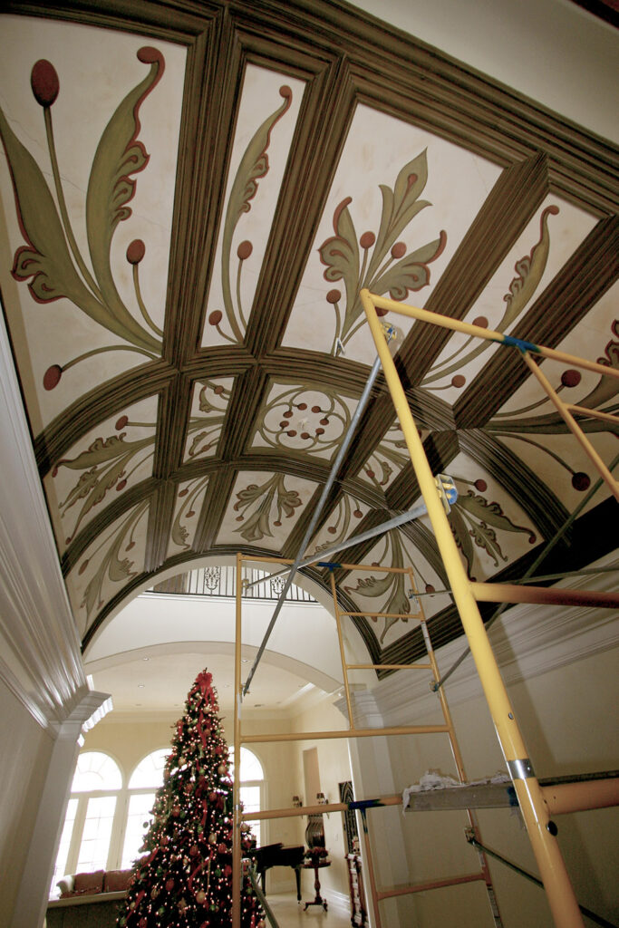 A photo of a mural painted for a barrel vaulted and coffered ceiling in Sarasota, FL