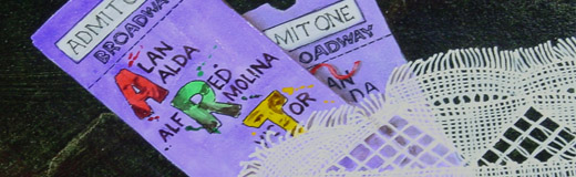 A detail photo of a painted coffee table showing theater tickets and lace table runner