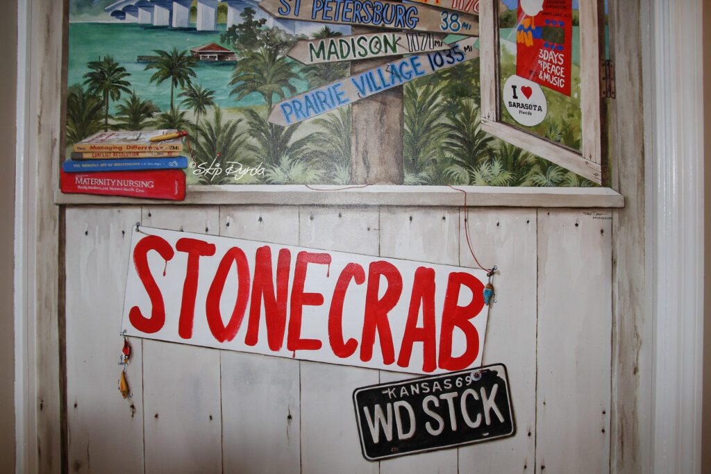 Photo of a smaller mural I painted for a condo in Sarasota, FL that shows an open window overlooking the bay.