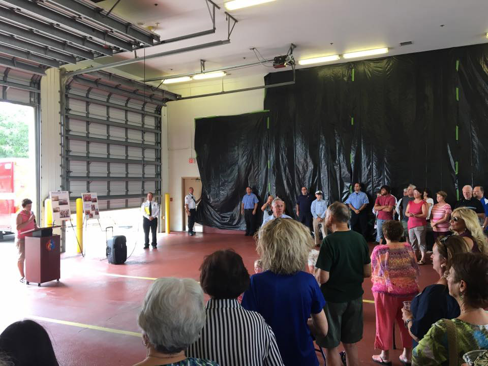 Photo of the unveiling of the firehouse mural.