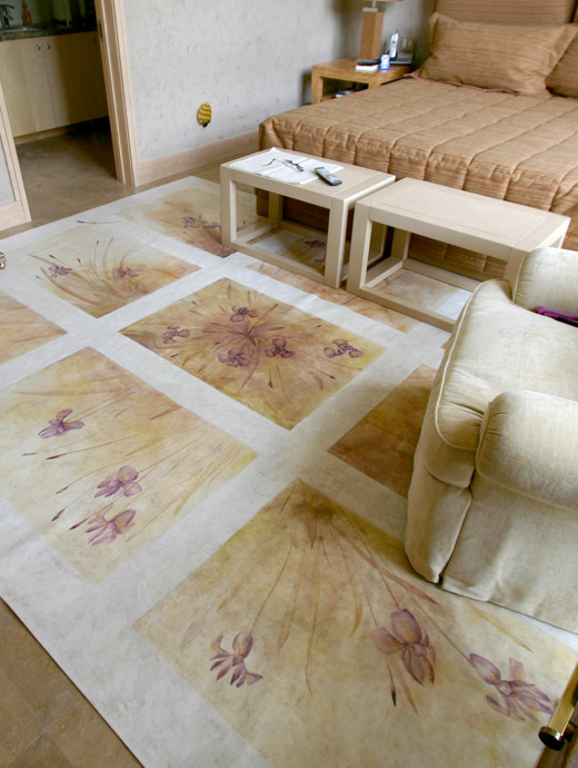 A photo of a large canvas painted floor cloth by Skip Dyrda