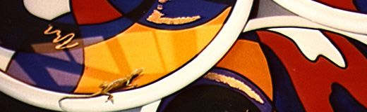 A detail photo of a set of three nesting tables I built and painted.