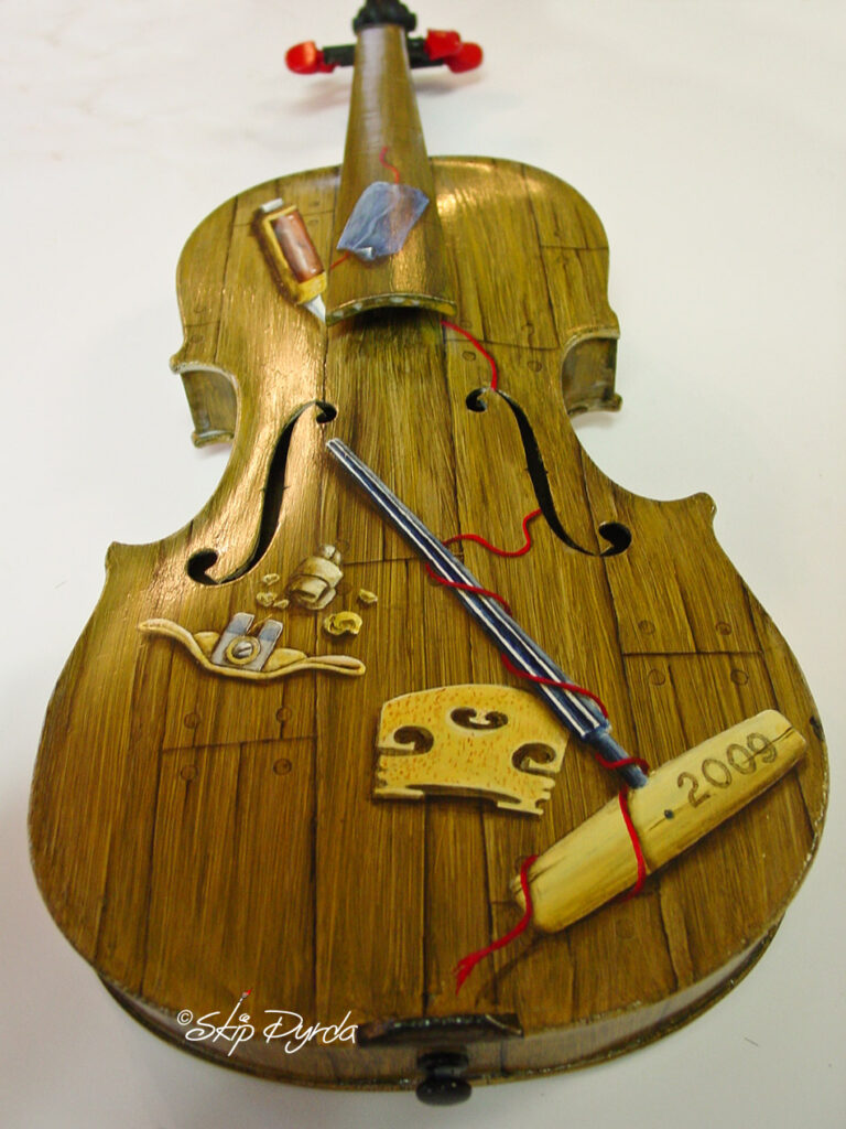 A photo of a violin that I painted for the Florida West Coast Symphony. Front side