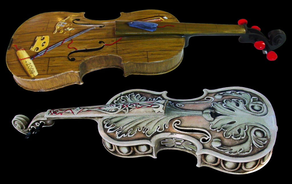 A photo of two violins that I painted for the Florida West Coast Symphoney