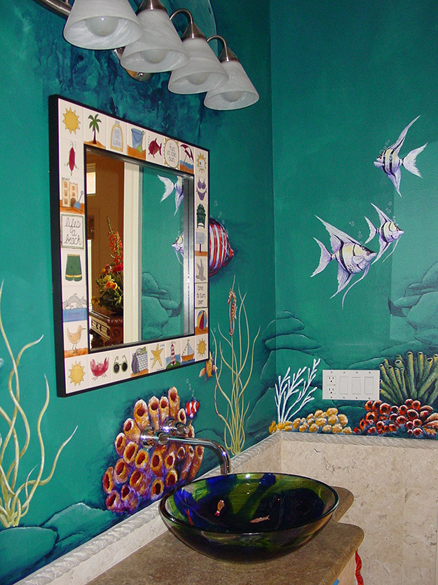 Photo of an underwater scene mural I painted on 3 walls inside of the pool powder room in DIck Vitales house.
