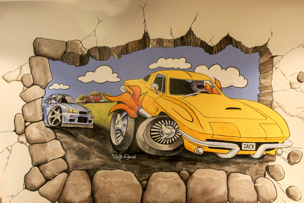 Photo of a wall mural of a cartoon style image of a big yellow corvette being chased by a BMW, by Skip Dyrda