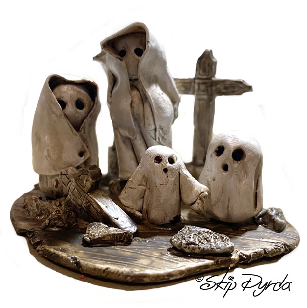 A photo of gnome figurines that I made with plastic clay and then painted