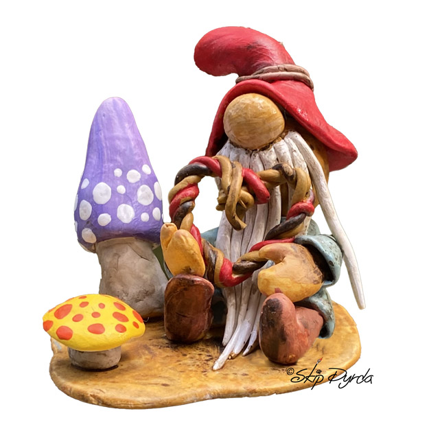 A photo of gnome figurines that I made with plastic clay and then painted