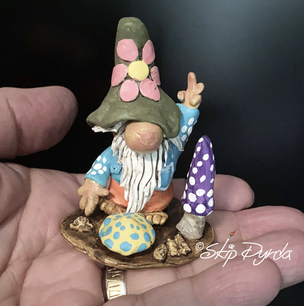 A photo of gnome figurines that I made with plastic clay and then painted