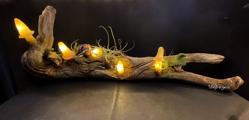 A photo of gnome figurines that I made with plastic clay and then painted