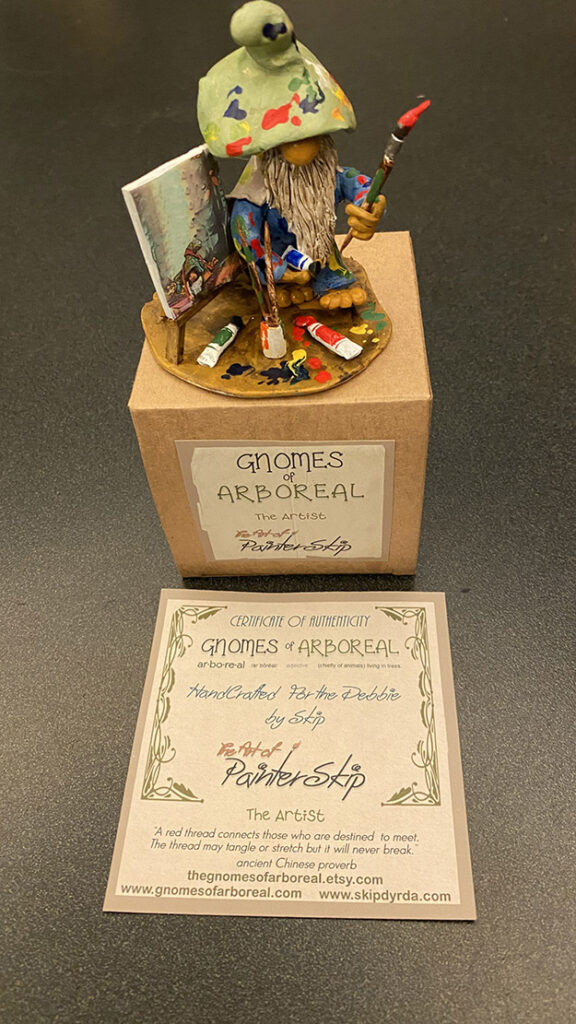 A photo of gnome figurines that I made with plastic clay and then painted