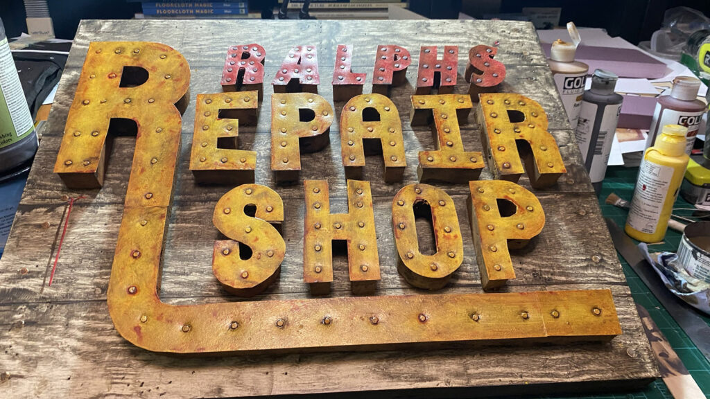 A photo of a custom three dimensional sign I made for someone's repair business
