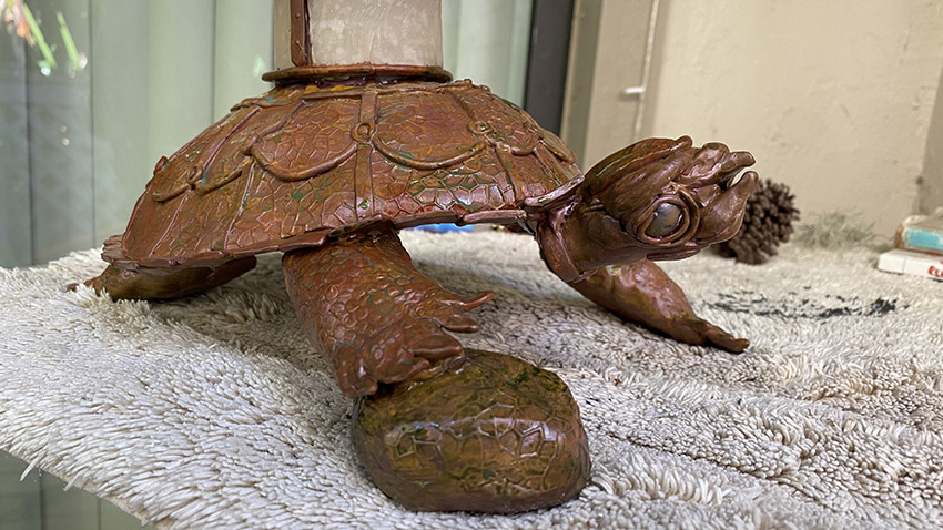 A photo of a table lamp that looks like a steampunk inspired turtle