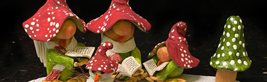 A photo of gnome figurines that I made with plastic clay and then painted